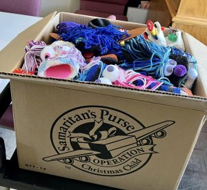 52 sock puppets (26 shoeboxes)